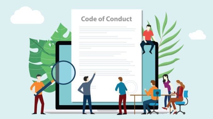 code of conduct team people work together on paper document on laptop screen 