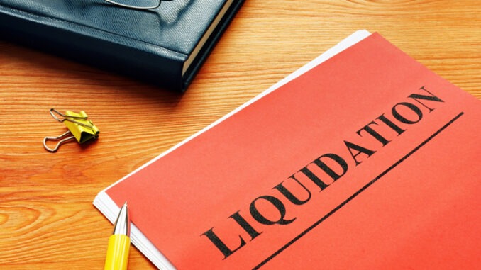 The word liquidation is printed on the red page.