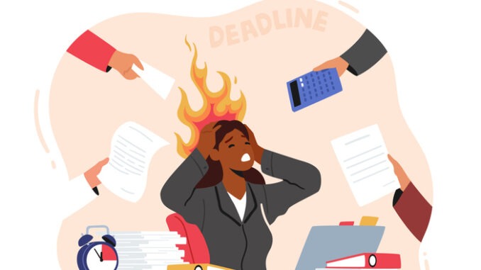 Overloaded Business Woman Holding Burning Head with Hands Sitting at Workplace with Messy Documents Heap in Office