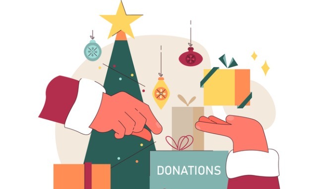 Christmas charity. Volunteers gathering holiday donations to help needy people 