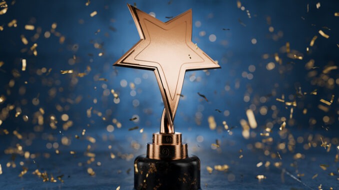 Gold star on a blue background as a reward. Top Performance Award. Winners Cup. Achievements. Victory. Goal achievement concept. Winner certificate. 