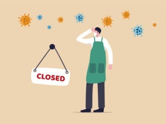 Coronavirus COVID-19 social distancing impact on entrepreneur or small business shop to closed with problem of employment, sad man business shop owner with closed sign and COVID-19 virus pathogen.