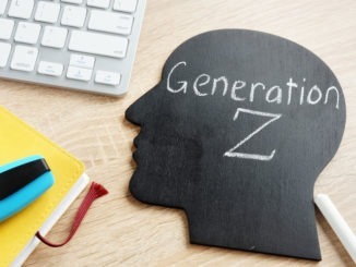 Generation Z written on a blackboard in the shape of a head.