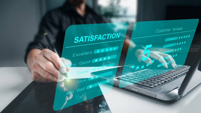 The concept of a customer satisfaction survey.Versual screen, business people or customers express their happiness. By awarding the highest level of satisfaction and five stars.