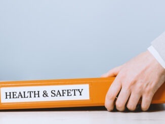 Health and safety labor protection and regulations at work place. Folder with documents or instructions. employees and their rights. Guidance or induction. Copy space