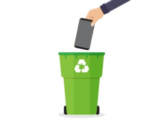 Hand throwing broken smart phone to recycling bin