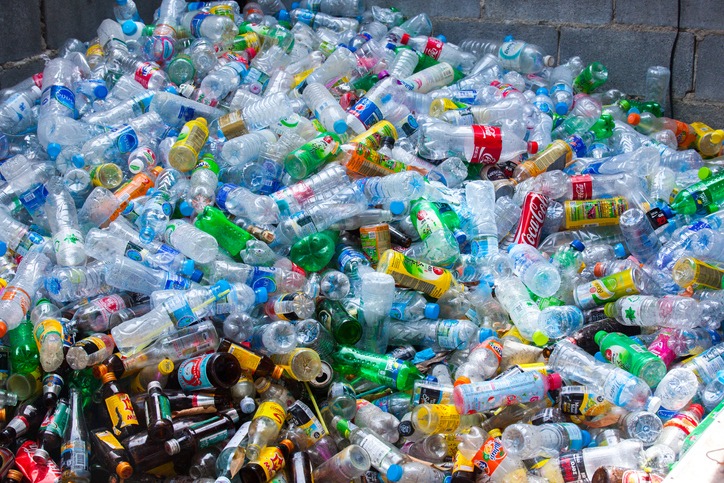 Mountain of plastic bottles. Large heap of plastic bottles and containers for recycling.