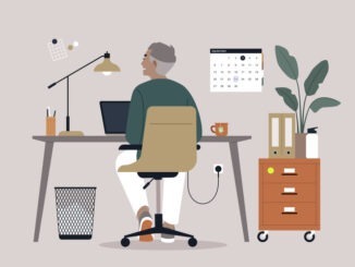 A senior character sitting at a desk, diligently using their computer,