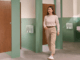 Woman walking in Washroom