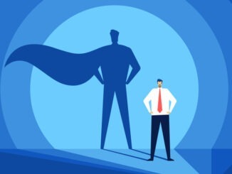 Businessman with superhero shadow.