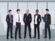 Team of Businessmen Characters in office Wearing Suits,