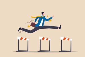 Success to win in business competition, overcome obstacles or motivation to solve problem and lead company achievement concept, confident businessman leader jump high over 3 hurdles to be winner.